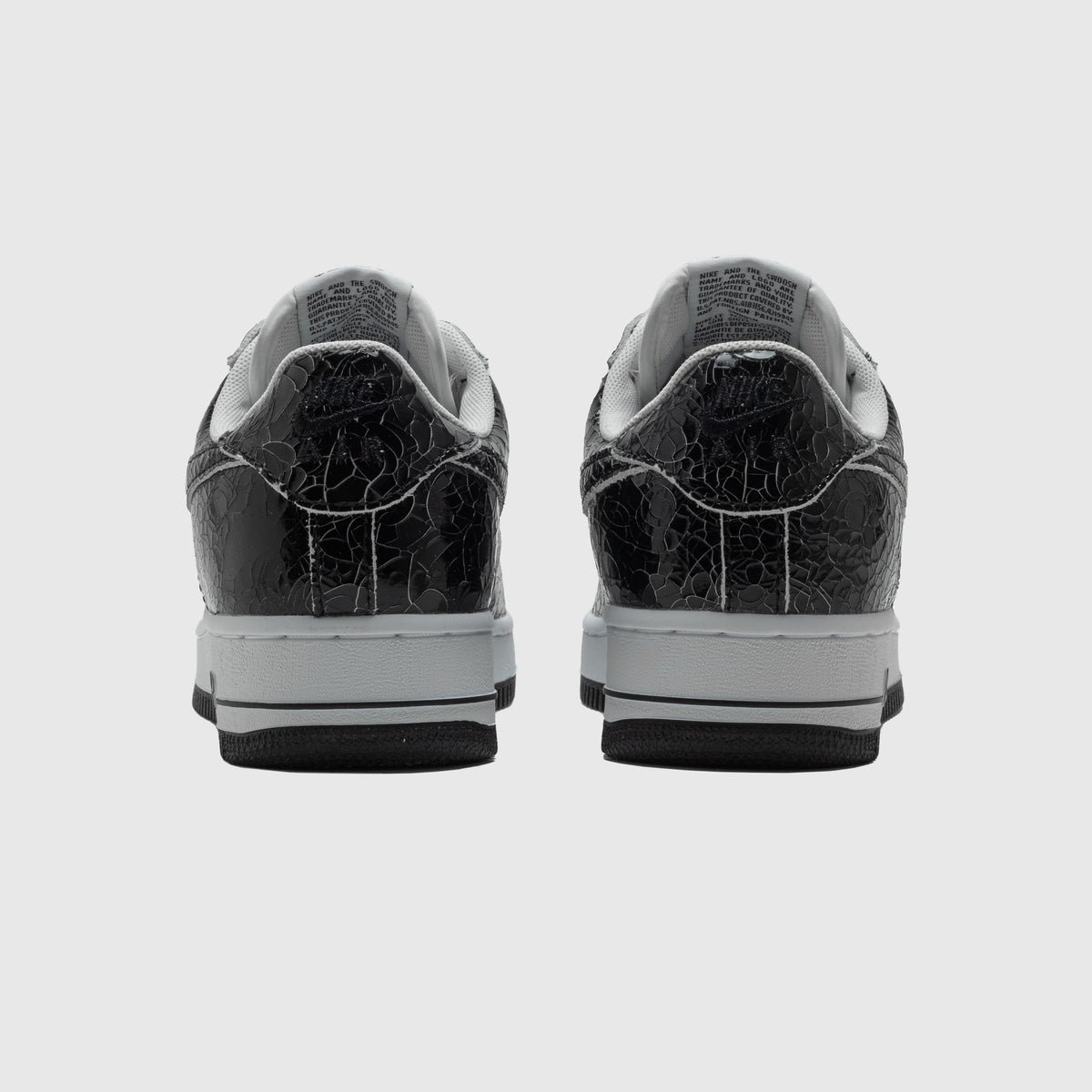 AIR FORCE 1 LOW CRACKED LEATHER "BLACK/WHITE"