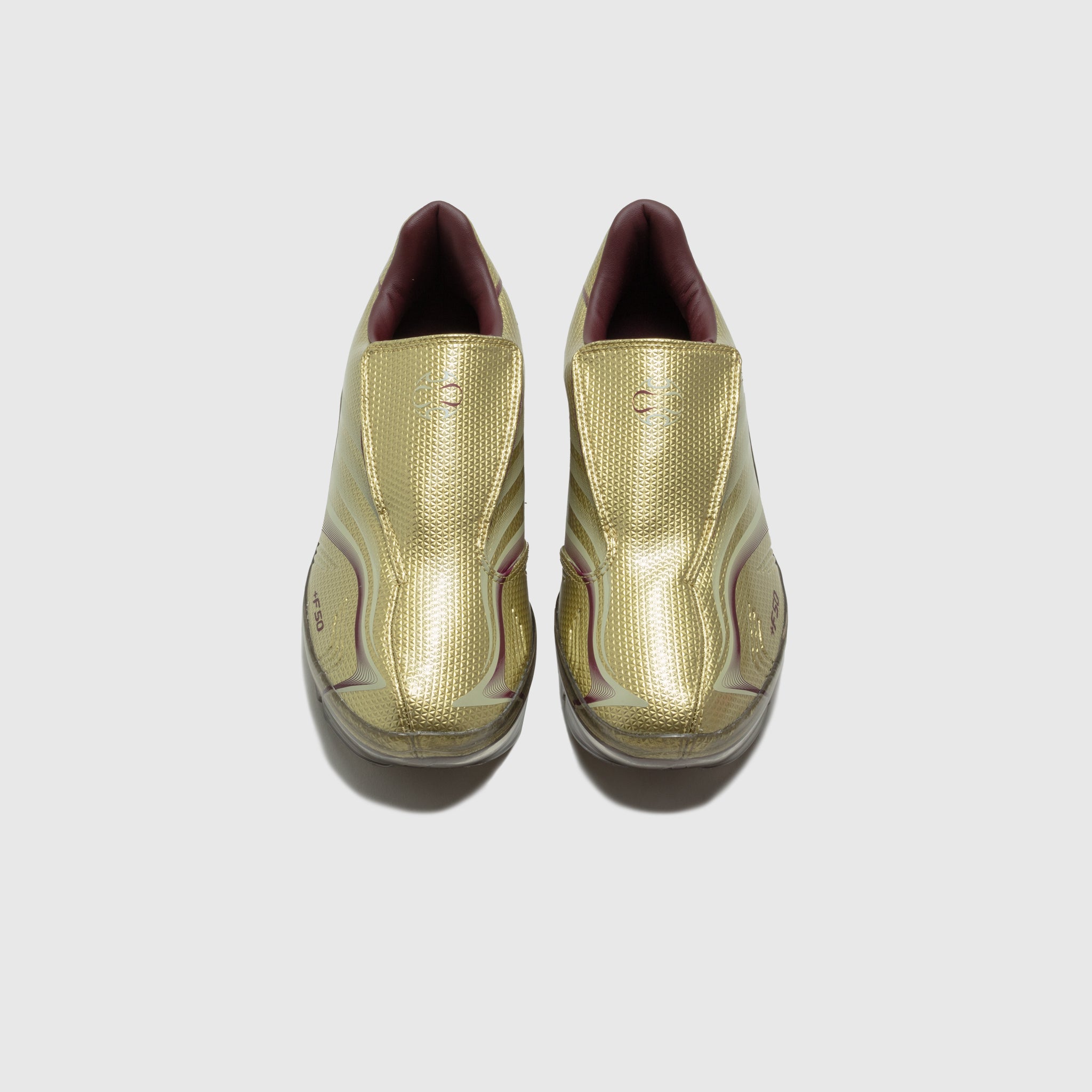 WMN'S F50 WALKABLE SHOES "GOLD METALLIC"
