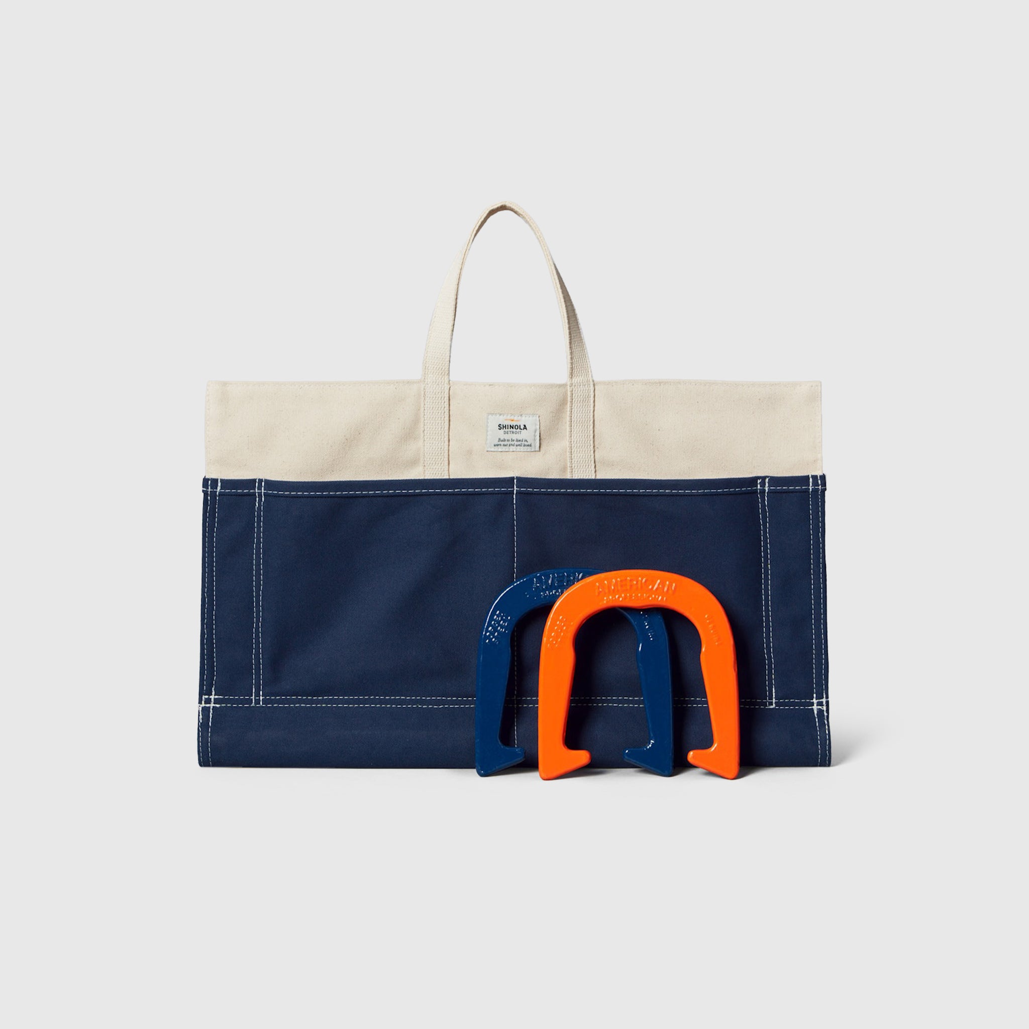 SHINOLA HORSESHOES IN CANVAS TOTE