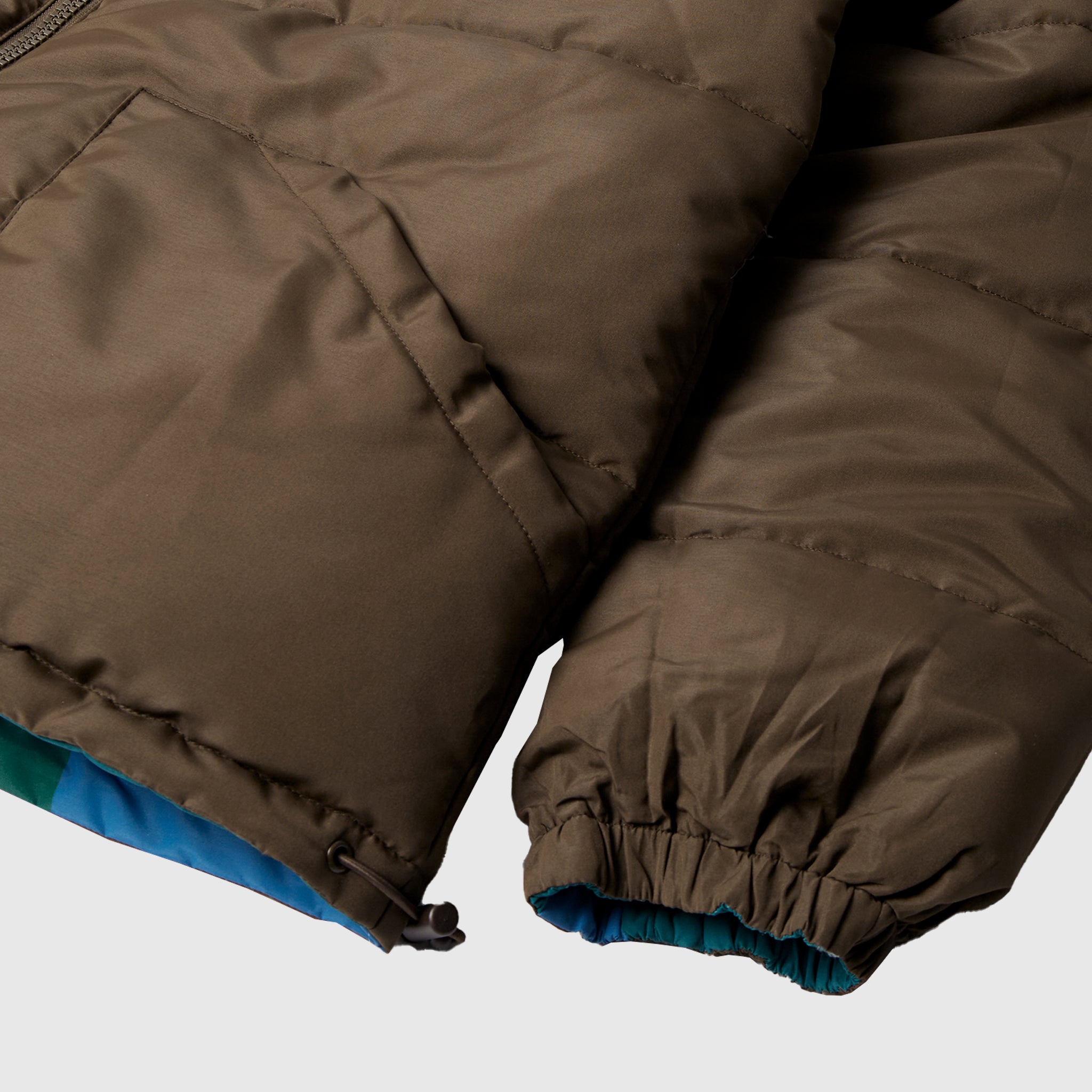 PROTECT THE SUN REVERSIBLE PUFFER JACKET