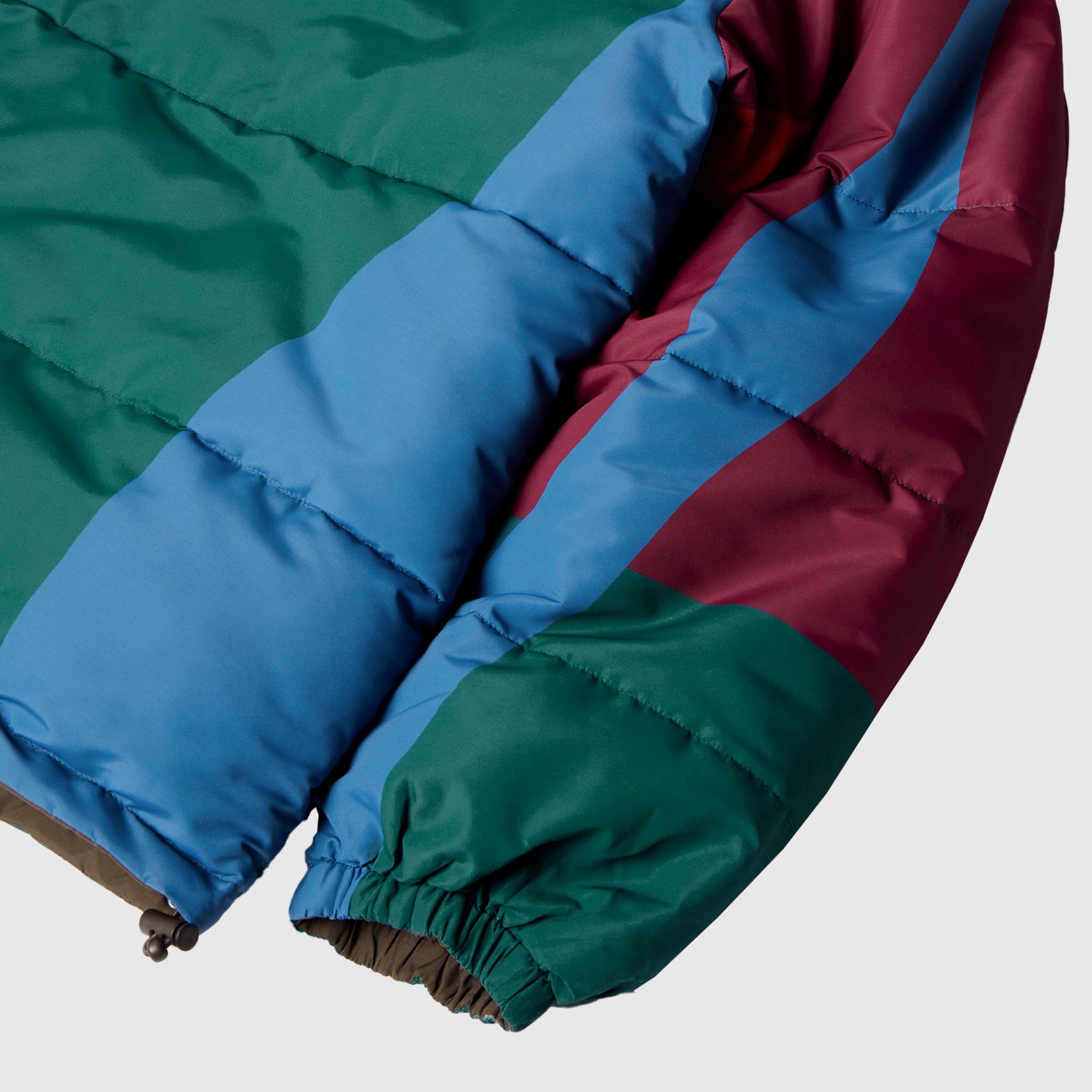 PROTECT THE SUN REVERSIBLE PUFFER JACKET