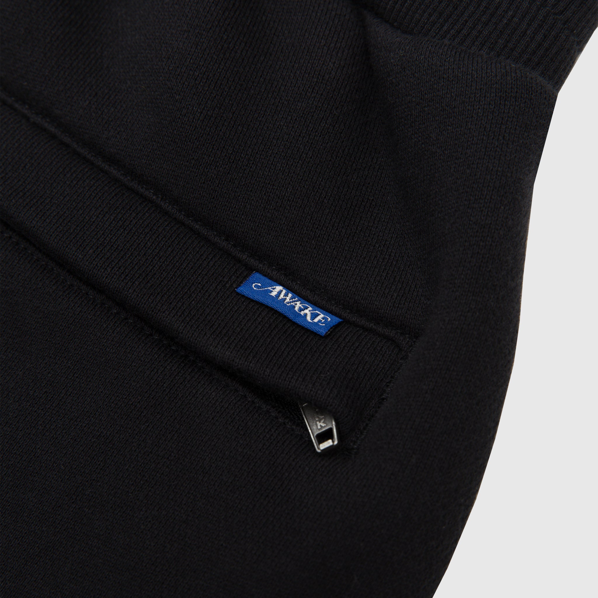 NEW YORK ARCH OPEN HEM SWEATPANTS