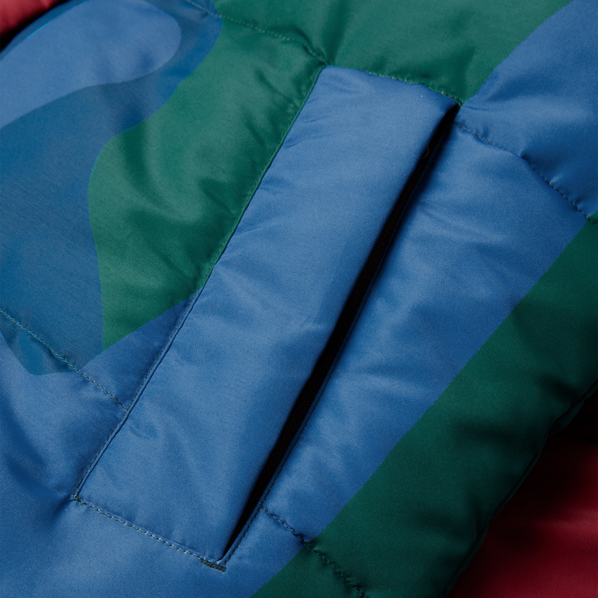 PROTECT THE SUN REVERSIBLE PUFFER JACKET