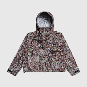 Rainwear elevated through material and silhouette. From Supreme's