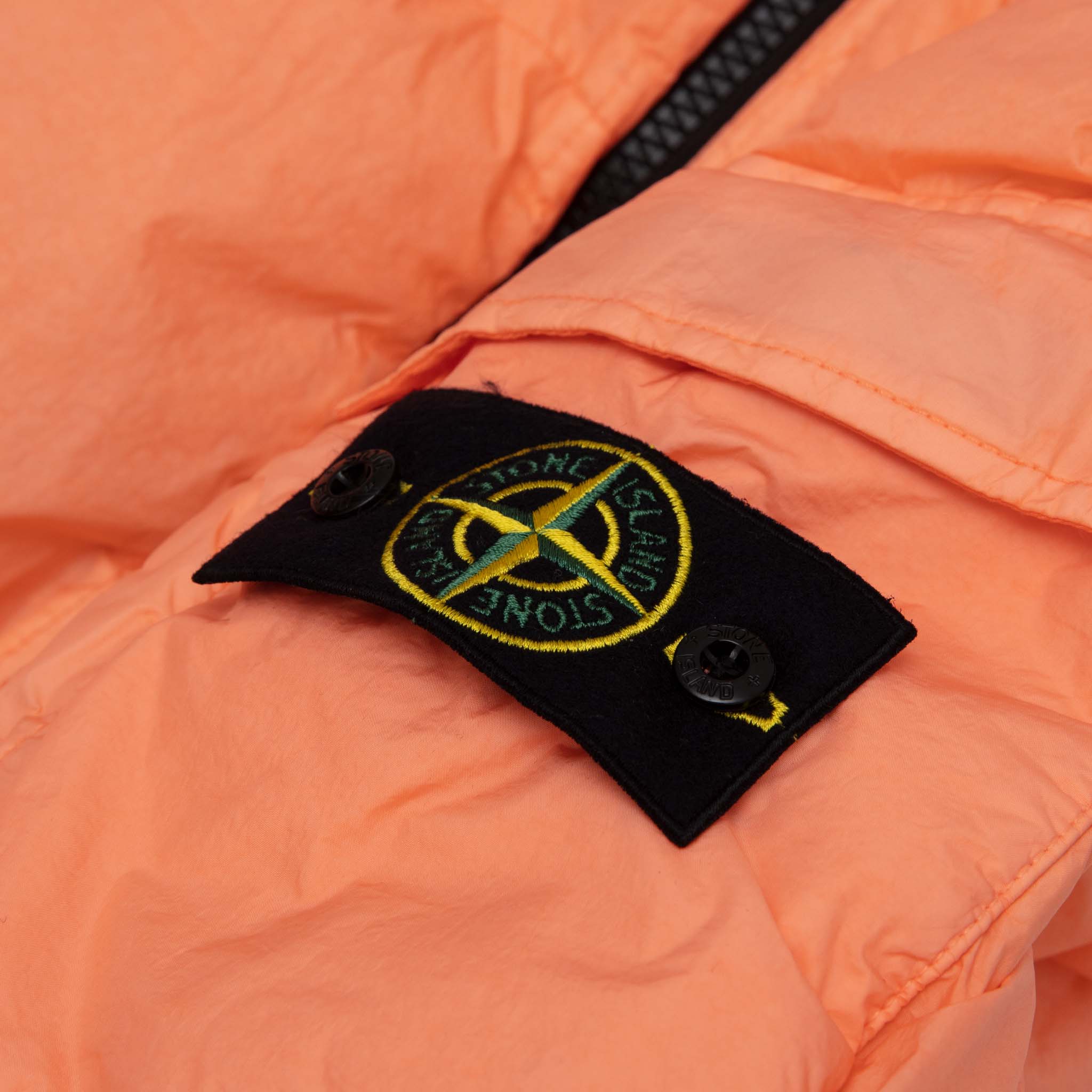 Peach stone island on sale jacket